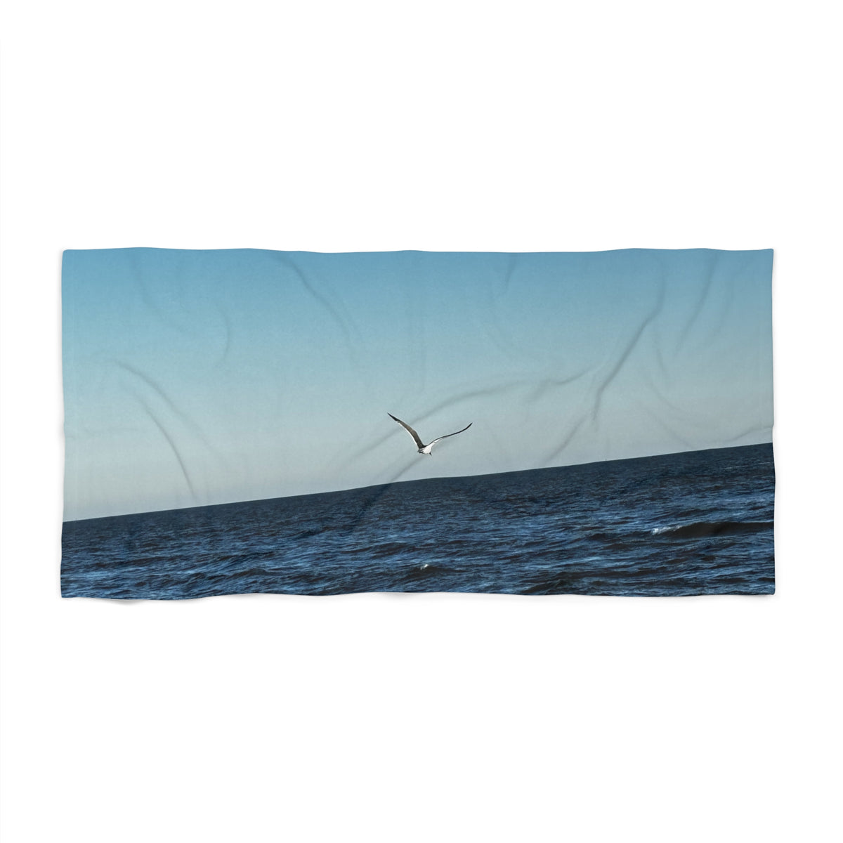 Lone Gull Soaring — Beach Towel